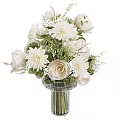 White Flowers in Transparent Glass Vase with Roses Dahlias and Green Foliage