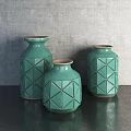 Three Green Ceramic Vases With Geometric Patterns On Dark Tabletop Against Gray Wall 3d model