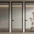 Three Modern Hinged Doors Featuring Glass Panels And Black Frames In Interior Design 3d model