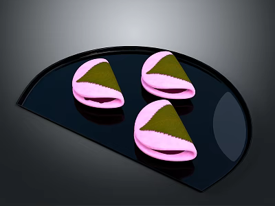 Three Pink Shell Green Filling Snacks on Black Fan Shaped Plate 3d model