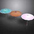 Colorful Standing Umbrellas Against Dark Background With Light Blue Brown And Pink Hues