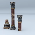 Three Decorative Columns of Different Heights with Ornate Carvings and Intricate Bases and Detailed Capitals
