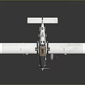 White Propeller Airplane Model With Brown Cockpit And Underwing Mounts On Gray Background