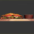 Fresh Croissant Sandwich With Tomato Lettuce On Wooden Tray And Side Cream Sauce Bowl