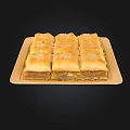Square Layered Pastries With Golden Crust Honey And Nut Filling On A Light Colored Tray
