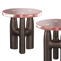 Modern Round Nesting Dining Tables With Rose Tinted Glass Top And Unique Dark Metal Legs
