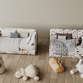 Two Cozy Kids Beds with Patterned Bedding on Wooden Floor and Plush Toys Around