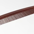 Dark Brown Wooden Comb With Long Teeth And Smooth Handle Design