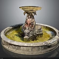 Classical Stone Fountain With Circular Base And Ornate Carved Pillar Topped With Shallow Basin
