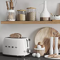 Organized Modern Kitchenware Display On Wooden Shelves With Jars Bowls Mugs And Cutting Boards