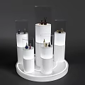 Window Display Merchandising Featuring White Cylindrical Pedestals And Glass Domes With Decorative Products