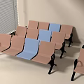 Public Waiting Area Chairs With Light Brown And Blue Seats Arranged In Rows