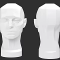 Cultural Art Gallery Displaying Low Poly Human Head Sculptures With Front And Back Views