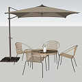 Outdoor Landscape Seating With Rattan Chairs Table And Sunshade Umbrella