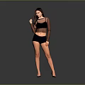 Young Woman In Sheer Black Top And Black Shorts Standing Against Gray Background