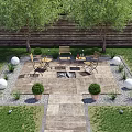 Courtyard Garden With Stone Patio Fire Pit Wooden Chairs And Outdoor Lights