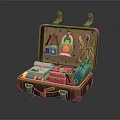 Open Brown Suitcase With Camera Kettle Rope Books And Colorful Box