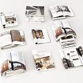 Multiple Opened Interior Design Books And Magazines Showcasing Home Decor Content