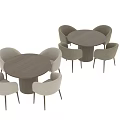 Modern Minimalist Round Dining Table With Four Soft Beige Fabric Upholstered Chairs For Cozy Dining Room