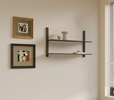 Light Wall Corner With Framed Abstract Paintings And Black Shelf Holding White Vase And Books 3d model