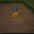 Gray and Yellow Dumbbell Shaped Outdoor Chair on Wooden Deck with Trees and Bushes