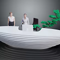 White Curved Reception Desk With Computer On Top And Green Tree Decor Beside Two People