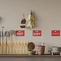 Rustic Agricultural Display With Hanging Corn Baskets Farm Tools Straw Red Signs And Stone Mill