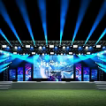 Outdoor Stage Setup With Blue Lighting Truss Framework Large Screen And Steps On Grass Field 3d model