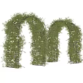 Green Vine Covered Outdoor Archways Decorated With White Flowers And Metal Frames