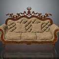 Classical Ornate Upholstered Sofa With Carved Wooden Frame And Patterned Cushions