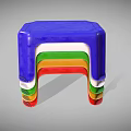 Colorful Stacked Plastic Stools With Blue Green Red Yellow And White Layers