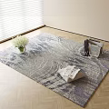 Square Carpet with Blue Gray Design on Wooden Floor Featuring White Flowers Magazines and Clothes