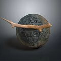 Artistic Stone Sphere Sculpture With Wooden Branch Handle And Textured Surface