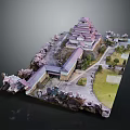 Traditional Multi Layered Pagoda Building With Cherry Blossom Trees And Garden Paths