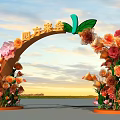 Elegant Event Gateway with Floral Arch Decorations and Warm Toned Flowers