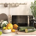 Fresh Vegetables And Kitchen Utensils On Countertop With Microwave Kettle And Bowls
