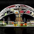 Modern Exhibition Booth With Curved White Framework Colorful Decorations Display Counters And Green Plants