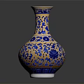 Blue And Gold Decorative Vase With Intricate Floral Patterns On Ceramic Body