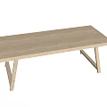Minimalist Wooden Dining Table With Light Wood Surface And Angled Support Legs