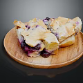 Delicious Blueberry Pastries with Flaky Golden Crust and Fresh Berries on Wooden Plate