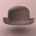 Classic Brown Bowler Hat With Matching Brown Band On Light Pink Background