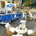 Blue KHOPPS Commercial Food Truck With Outdoor Wicker Seating In Mall Courtyard