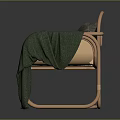 Modern Light Brown Rattan Leisure Chair with Gray Wavy Pattern Cushion and Green Blanket