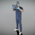 Male doctor wearing blue scrub suit surgical cap mask and gloves examining X-ray