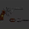 Two Different Sizes Revolvers With Metal Body And Brown Wooden Grips On Dark Background