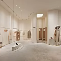 Minimalist Clothing Store Interior With Hanging Clothes Lingerie Mirror Display Stand And Accessories