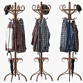Clothes On Three Coat Racks With Various Styles Hats And Umbrellas 3d model