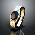 Elegant Golden Mesh Strap Watch With Black Dial On Display Stand