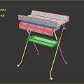 Portable Baby Changing Table With White Metal Frame And Colorful Patterned Pad