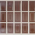 Display of Various Brown Wooden Wardrobe Doors with Golden Accent Designs